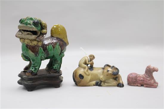 A Chinese sancai lion, a soapstone horse and similar ox group